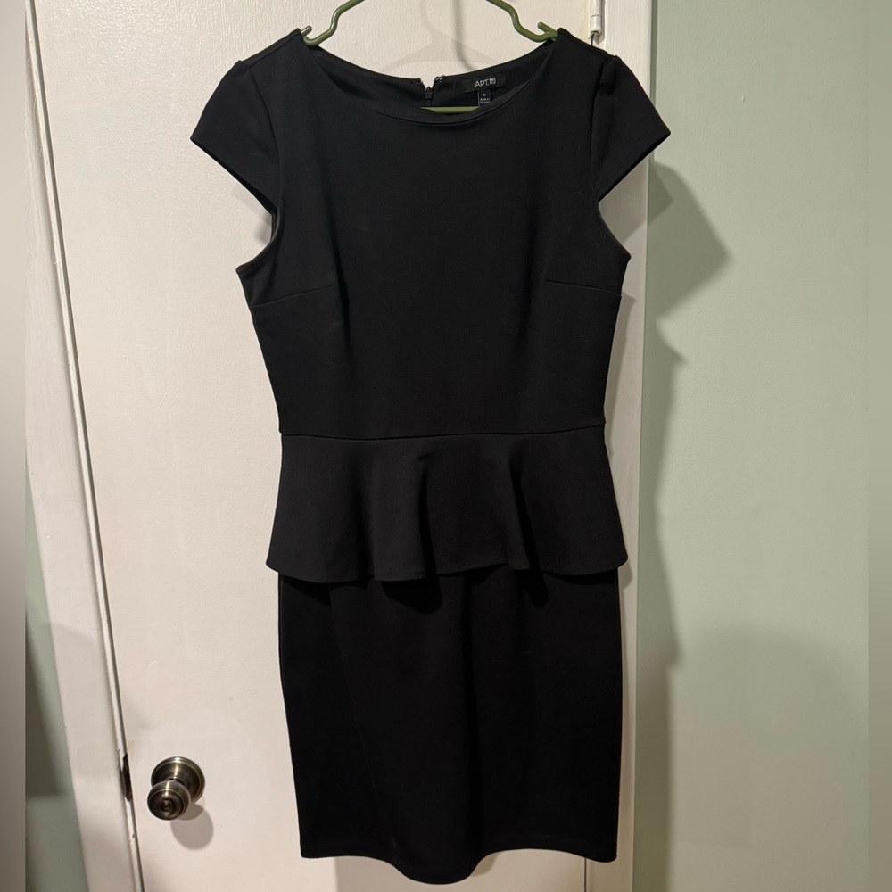 Black dress with peplum